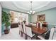 Inviting dining room with view to the open concept floorplan and the living spaces at 1490 Rivershyre Pkwy, Lawrenceville, GA 30043