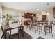 Spacious eat-in kitchen with granite countertops, an island, and a window overlooking the backyard at 1490 Rivershyre Pkwy, Lawrenceville, GA 30043