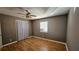 Bedroom featuring a window, ceiling fan, and neutral paint at 2388 Lawrenceville Hwy # D, Decatur, GA 30033