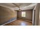 Charming bedroom featuring hardwood floors, a ceiling fan, and closet at 2388 Lawrenceville Hwy # D, Decatur, GA 30033