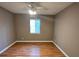 Empty bedroom with hardwood floors and ceiling fan at 2388 Lawrenceville Hwy # D, Decatur, GA 30033