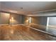 Large living room featuring mirrored wall and neutral paint at 2388 Lawrenceville Hwy # D, Decatur, GA 30033