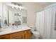 Bathroom featuring shower, updated vanity, and lots of natural light at 548 W Oaks Dr, Woodstock, GA 30188