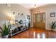Inviting foyer with hardwood floors and decorative console table creates a warm welcome at 200 Sugar Mill Ln, Canton, GA 30115