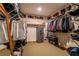 Spacious walk-in closet with ample shelving, hanging racks, and plenty of storage at 200 Sugar Mill Ln, Canton, GA 30115