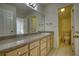 Bathroom featuring a granite sink and access to the shower/toilet area at 1660 Weems Rd, Locust Grove, GA 30248