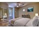 A luxurious bedroom featuring a large bed and mirrored closet at 1660 Weems Rd, Locust Grove, GA 30248