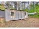 Exterior of the outbuilding showing ample space for storage at 1660 Weems Rd, Locust Grove, GA 30248