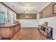 Inviting dining area with wainscoting, natural light, and stylish decor creates a welcoming ambiance at 220 Alcovy Reserve Way, Covington, GA 30014