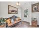 Charming entryway featuring stylish decor, a cozy bench with decorative pillows, and beautiful flooring at 220 Alcovy Reserve Way, Covington, GA 30014