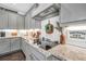 Kitchen with an induction cooktop and subway tile backsplash at 220 Alcovy Reserve Way, Covington, GA 30014