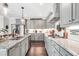 Kitchen with stainless steel appliances, granite countertops, and a Farmer's Market sign at 220 Alcovy Reserve Way, Covington, GA 30014