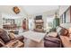 Spacious living room with stone fireplace, vaulted ceiling, and open access to the kitchen at 220 Alcovy Reserve Way, Covington, GA 30014