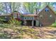 Brick home with deck and shed in the backyard at 2352 Rockwood Way, Stone Mountain, GA 30087