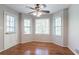 Inviting dining area featuring hardwood floors, bright natural light, and a convenient door to the outside at 2352 Rockwood Way, Stone Mountain, GA 30087