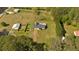 Aerial shot of a large lot with a home, pool, shed, and lots of green space in a rural setting at 40 L Z Jackson Road, Bowdon, GA 30108