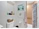 This bathroom has tiled shower with decorative shower curtain at 40 L Z Jackson Road, Bowdon, GA 30108