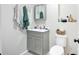 Bathroom with gray vanity, a matching gray tiled floor, and modern fixtures at 40 L Z Jackson Road, Bowdon, GA 30108