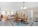 Open-concept dining area with a table that seats six in a naturally lit room at 40 L Z Jackson Road, Bowdon, GA 30108
