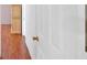 Hallway with a wooden floor and a cabinet at 40 L Z Jackson Road, Bowdon, GA 30108