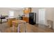 Cozy kitchen with essential appliances and drop-leaf table at 40 L Z Jackson Road, Bowdon, GA 30108