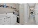 Bright laundry room with appliances and plenty of storage space at 40 L Z Jackson Road, Bowdon, GA 30108