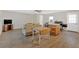 Open floor plan living room featuring a wood-burning fireplace at 40 L Z Jackson Road, Bowdon, GA 30108