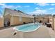 In-ground pool in backyard with patio, pergola, and a privacy wall at 40 L Z Jackson Road, Bowdon, GA 30108