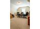 Bright home office features desk, chairs, bookcase, and large window at 9989 Village South Dr, Douglasville, GA 30135
