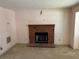 Living room featuring a brick fireplace, perfect for cozy evenings at 1477 Springleaf Se Cir, Smyrna, GA 30080