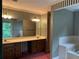 Bathroom featuring double vanity, large mirrors and a soaking tub at 3798 Lee Ridge Sw Way, Lilburn, GA 30047