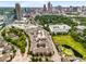 Beautiful aerial view of the complex and the city skyline in the background with a pond and golf course at 400 17Th Nw St # 2125, Atlanta, GA 30363