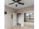 View of bedroom with carpet, mirror closet doors, and a door leading to other rooms at 400 17Th Nw St # 2125, Atlanta, GA 30363