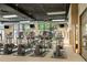 Bright gym area featuring rows of modern elliptical machines and large windows at 400 17Th Nw St # 2125, Atlanta, GA 30363