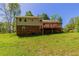Exterior of home showcasing the spacious backyard at 4170 N Quail N Dr, Douglasville, GA 30135