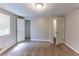 Bedroom with two windows and doorways at 4170 N Quail N Dr, Douglasville, GA 30135