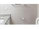 Well lit bathroom with granite counter and neutral walls at 5439 Farmview Close, Stone Mountain, GA 30088