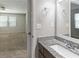 Granite vanity in the bathroom with view into bedroom at 5439 Farmview Close, Stone Mountain, GA 30088