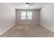 Bright bedroom features a ceiling fan and double windows at 5439 Farmview Close, Stone Mountain, GA 30088
