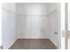 Spacious walk-in closet with shelving for storage at 5439 Farmview Close, Stone Mountain, GA 30088