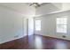 Bedroom with a tray ceiling, ceiling fan and a window offering natural light at 101 Valleydale Dr, Stockbridge, GA 30281