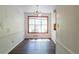 Open-concept dining area filled with natural light from a large window at 101 Valleydale Dr, Stockbridge, GA 30281