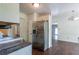 Dining area with wood-look floors, stainless steel fridge, and a view to another room at 101 Valleydale Dr, Stockbridge, GA 30281