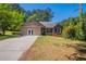 Charming single-story home with a well-maintained front yard and a classic driveway at 101 Valleydale Dr, Stockbridge, GA 30281