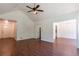Spacious living room features vaulted ceilings and dark wood flooring for a modern touch at 101 Valleydale Dr, Stockbridge, GA 30281