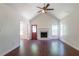 Bright living room boasts vaulted ceilings, a fireplace, and wood-look floors at 101 Valleydale Dr, Stockbridge, GA 30281