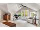 Spacious bedroom featuring a desk, cozy chair, and a charming balcony at 1157 Hancock Ne Dr, Atlanta, GA 30306