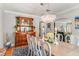 Formal dining room with decorative lighting, hardwood floors, and period furnishings at 1157 Hancock Ne Dr, Atlanta, GA 30306