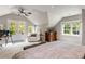 Bright main bedroom with sitting area, desk and double doors to private balcony at 1157 Hancock Ne Dr, Atlanta, GA 30306