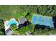 Aerial view of the community amenities including the pool, tennis courts, and clubhouse at 125 Stoney Ridge Dr, Alpharetta, GA 30022